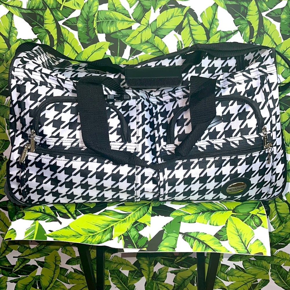 Rockland Houndstooth pattern rolling duffle bag.